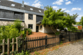 Außenansicht - Familienfreundliches Reihenmittelhaus mit ausgebautem Dachgeschoss und großem Platzangebot