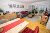 Wohnzimmer - 2-Zimmer-Eigentumswohnung mit Terrasse, Tiefgaragenstellplatz und Aufzug Pelikanviertel