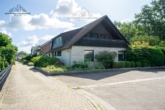 Ostansicht - -RESERVIERT- Einfamilienhaus mit Kamin, Bar und Doppelgarage in traumhafter Feldrandlage von Garbsen