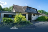 Titelbild - Einfamilienhaus mit Kamin, Bar und Doppelgarage in traumhafter Feldrandlage von Garbsen
