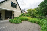 Terrasse - -RESERVIERT- Einfamilienhaus mit Kamin, Bar und Doppelgarage in traumhafter Feldrandlage von Garbsen