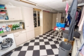 Hauswirtschaftsraum - Einfamilienhaus mit Kamin, Bar und Doppelgarage in traumhafter Feldrandlage von Garbsen