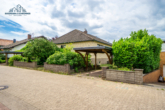 Ostseite Blick von rechts - Raumwunder in Garbsen-Osterwald – Einfamilienhaus mit großem Garten, Wintergarten, Sauna