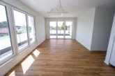 Wohnzimmer - Neubau Penthouse Wohnung mit Dachterrasse in Steinhude