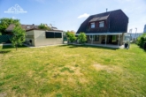 Garten - Einfamilienhaus mit großzügigem Garten, drei Garagen und hochwertiger Ausstattung in Laatzen