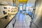 1. Ebene Küche - Großzügige 4-Zimmer-Maisonette mit 2 Balkonen, Dachterrasse & Garage in Garbsen-Berenbostel