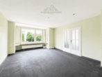 Wohnzimmer - Geräumige 3-Zimmer-Wohnung in zentraler Lage in Berenbostel