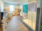 OG Bad - Mischimmobilie mit Zweifamilienhaus und vermieteter Werkstatt-/Lagerhalle auf 3.885 m² in Garbsen