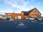 Titelbild - Mischimmobilie mit Zweifamilienhaus und vermieteter Werkstatt-/Lagerhalle auf 3.885 m² in Garbsen