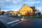 Außenansicht - Mischimmobilie mit Zweifamilienhaus und vermieteter Werkstatt-/Lagerhalle auf 3.885 m² in Garbsen