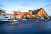 Außenansicht - Mischimmobilie mit Zweifamilienhaus und vermieteter Werkstatt-/Lagerhalle auf 3.885 m² in Garbsen