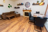 Wohnzimmer - Gemütliche 2-Zimmer-Erdgeschosswohnung mit Blick ins Grüne