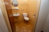 Gäste WC - Wohnen auf versetzten Ebenen – Reihenendhaus in Barsinghausen
