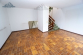 Wohnzimmer - Wohnen auf versetzten Ebenen – Reihenendhaus in Barsinghausen