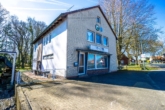 Außenansicht - Raum für Ideen – Wohnhaus mit Gewerbeteil auf großem Grundstück mit idealer Parksituation