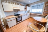 Küche - mittels KI leergeräumt - Reihenmittelhaus mit Terrasse und Garten in Garbsen