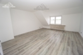 Wohnzimmer - Dachgeschosswohnung mit gemütlicher Dachterrasse in Langenhagen