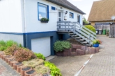 Garageneinfahrt - Großzügiges Einfamilienhaus mit Werkstatt, gepflegtem Garten und vielseitigem Raumangebot