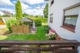 EG Terrasse / Garten - Gepflegtes Mehrfamilienhaus mit 3 Wohneinheiten – attraktive Kapitalanlage in Wunstorf