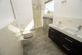 Badezimmer - Exklusive Penthouse Wohnung mit riesiger Dachterrasse, 2 TG-Stellplätzen & moderner Energietechnik