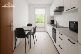 Einrichtungsbeispiel Küche - Großzügige 3,5-Zimmer-Wohnung mit Terrasse, Balkon und Tiefgaragenstellplatz in top Lage