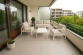 Einrichtungsbeispiel Terrasse - Großzügige 3,5-Zimmer-Wohnung mit Terrasse, Balkon und Tiefgaragenstellplatz in top Lage