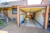 Garage - Geräumige Doppelhaushälfte mit Partykeller, großzügigem Garten, Kamin & Sauna