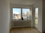 Wohnzimmer - Sanierte 2-Zimmer-Wohnung mit Balkon und Stellplatz in Berenbostel